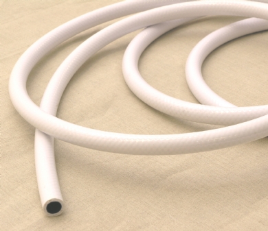 Click to enlarge - Flexible hose made from PVC cover, polyester braid and a Hytrel polyester elastomer liner. FDA and WRC approved. Used in vending machines and all potable water applications. Also available in an unreinforced version.